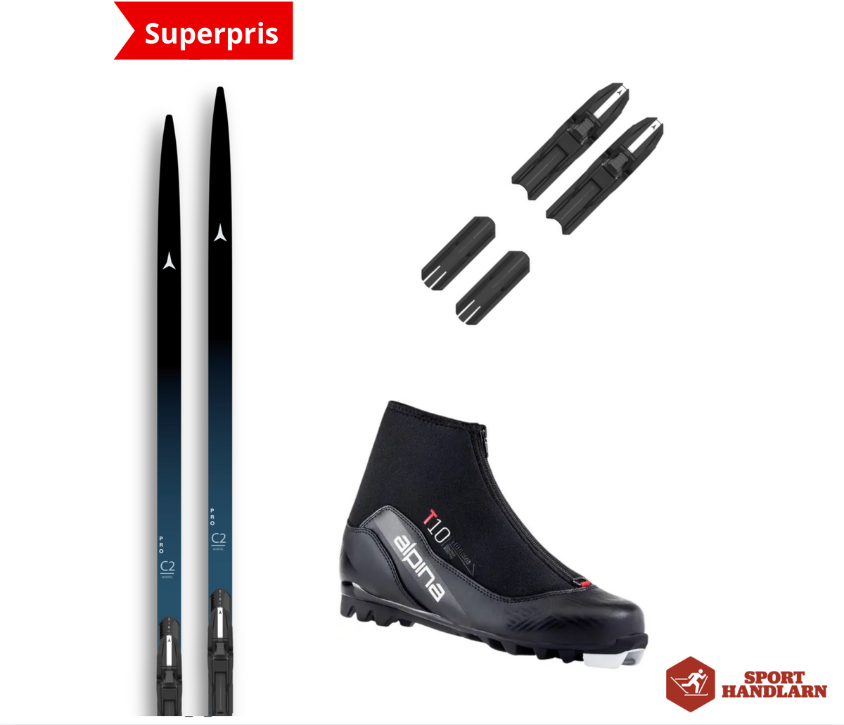 Atomic C2 längdpaket med bindning och pjäxor, visande längdskidor och utrustning i snöig miljö.